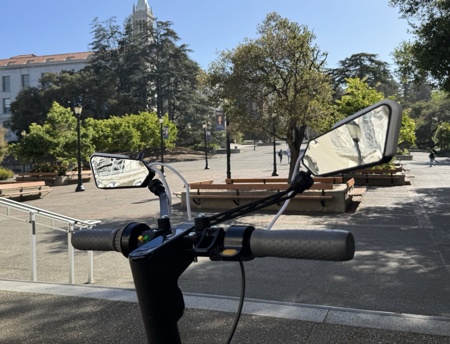 Scooter Vision mirrors mounted on a handlebar, photographed on the Berkeley campus