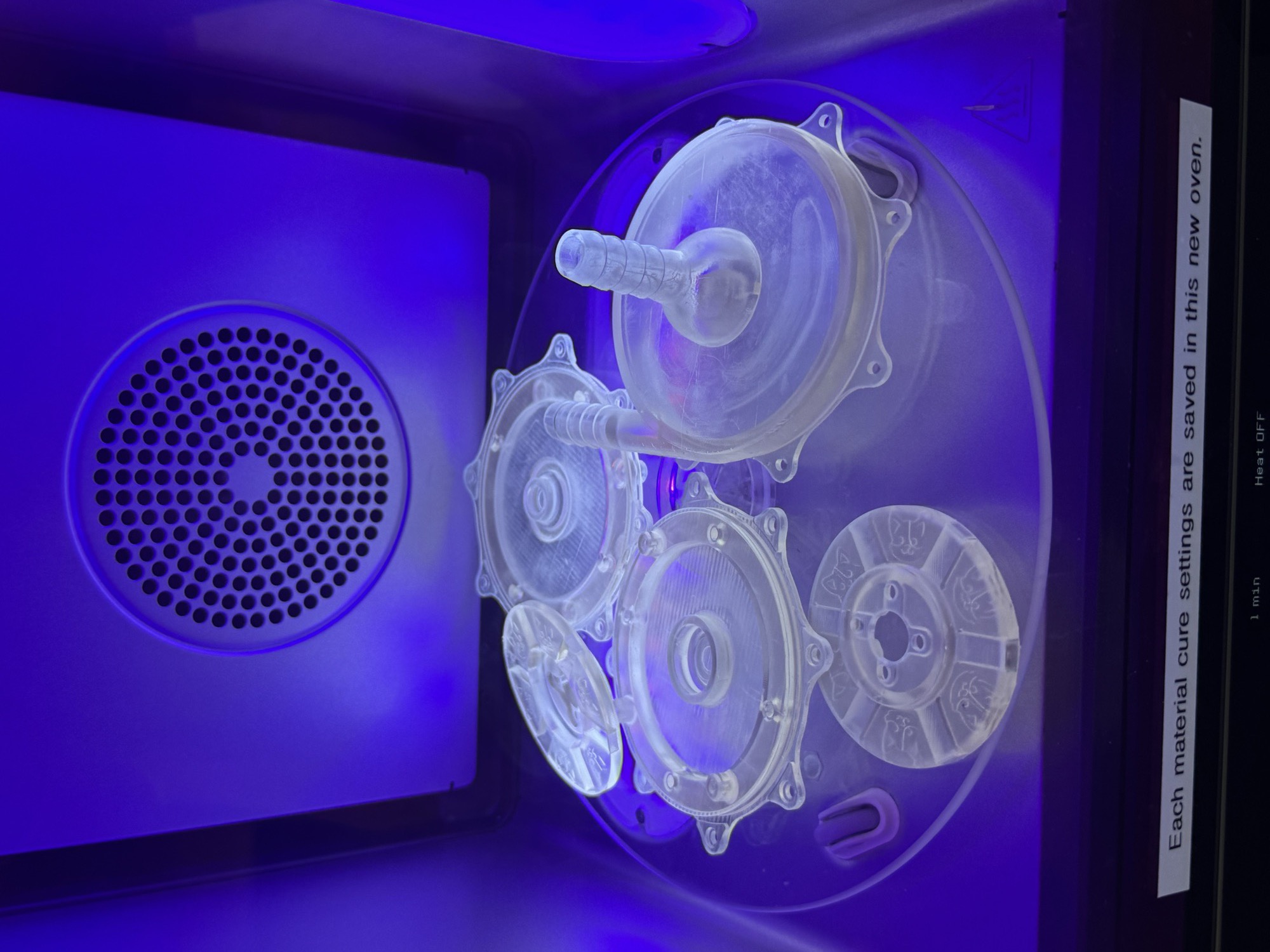 Volute housings, impellers and diaphragms post-curing under UV in the Form Cure oven