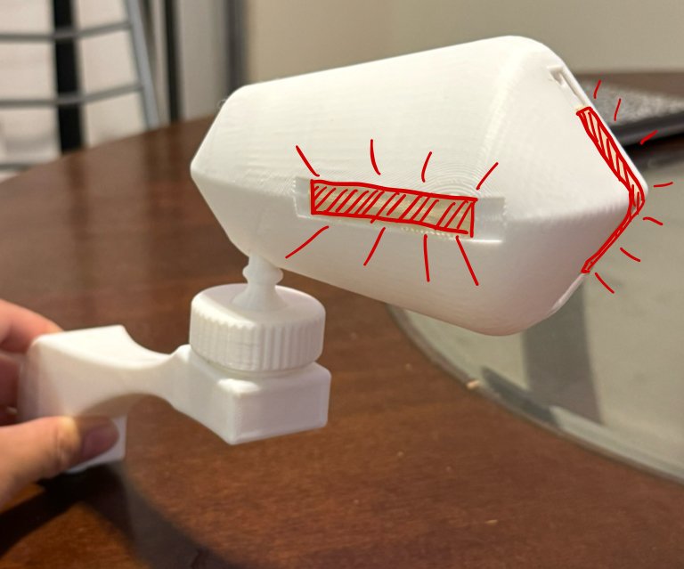 Prototype mirror housing with the intended integrated light system marked on it