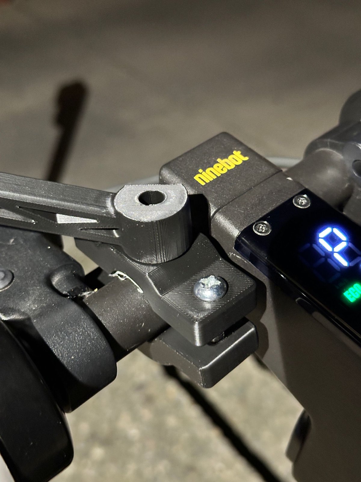 Printed handlebar clamp and thumb switch mounted on a Ninebot stem